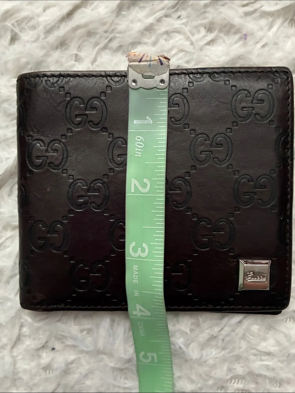 Gucci Dark Brown Embossed GG Leather Wallet with Silver Plaque